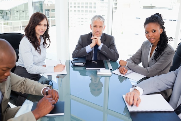 Corporate law documents and contracts being reviewed by qualified legal experts