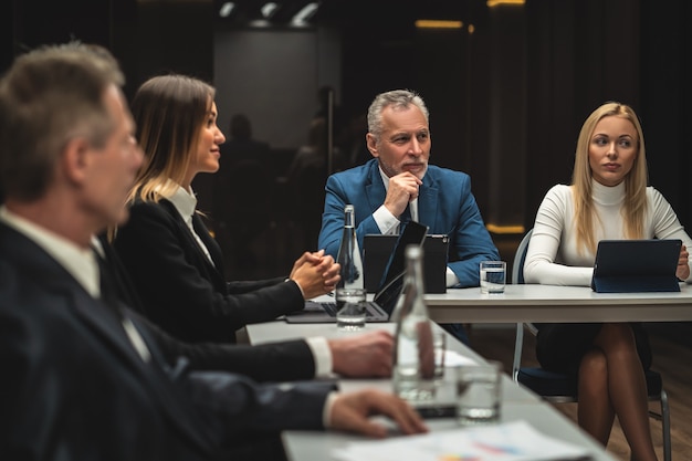 Successful case resolution handshake between legal advisor and satisfied client